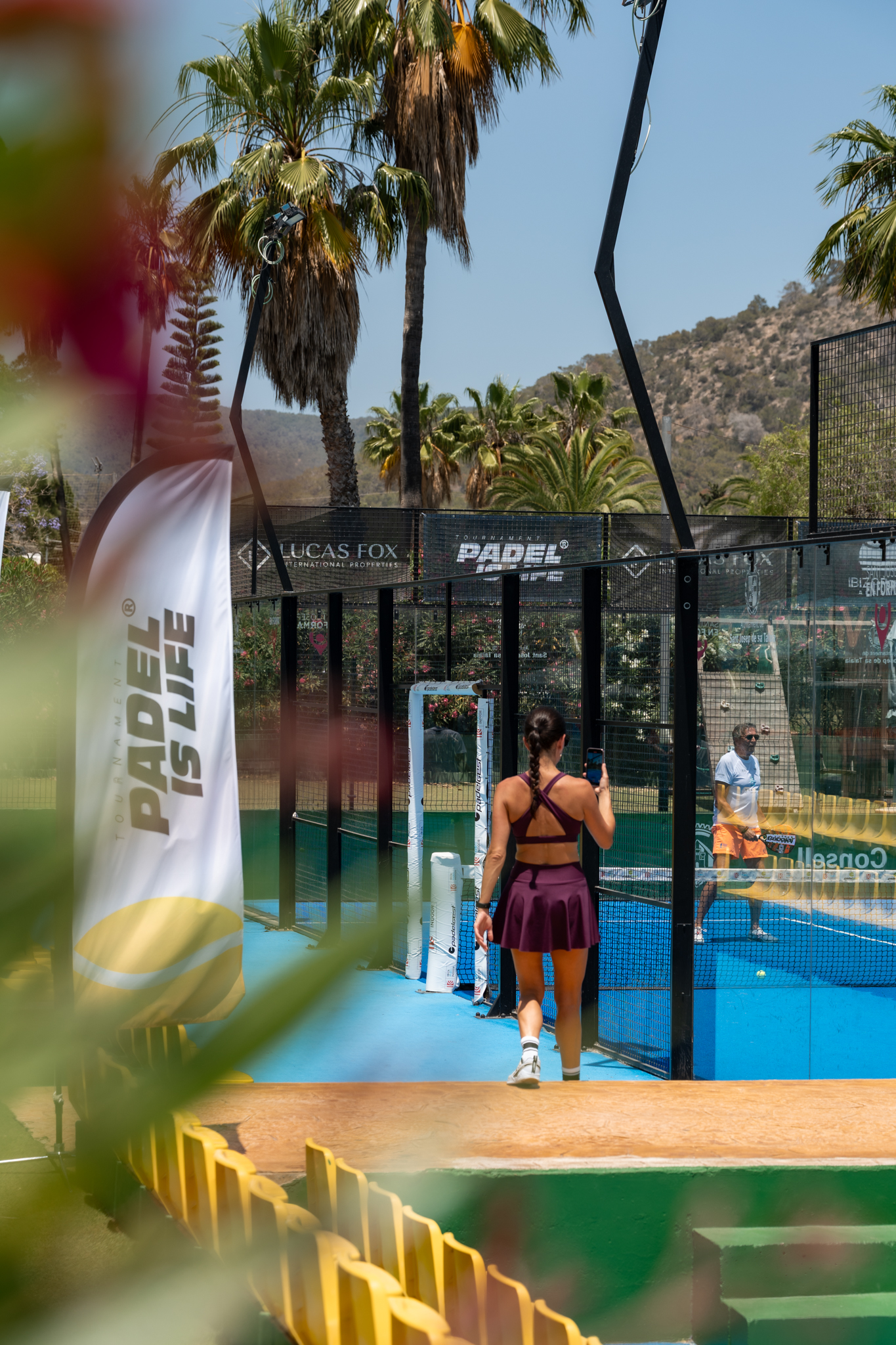 A player walking onto the court at the Padel is Life tournament in Ibiza